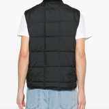 Black jackets-coats worn by a person, showing the jackets-coats's fit