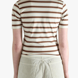 Brown t-shirt worn by a person, showing the t-shirt's fit