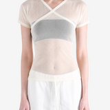 Tan top worn by a person, showing the top fit