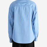 Blue shirt, full body view