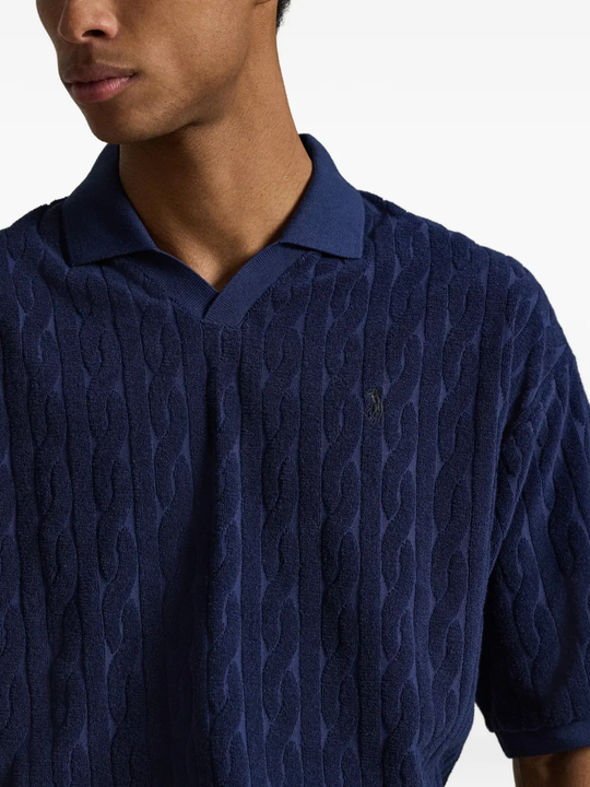 Blue shirt worn by a person, showing the shirt fit