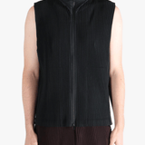 Black vest worn by a person, showing the vests fit