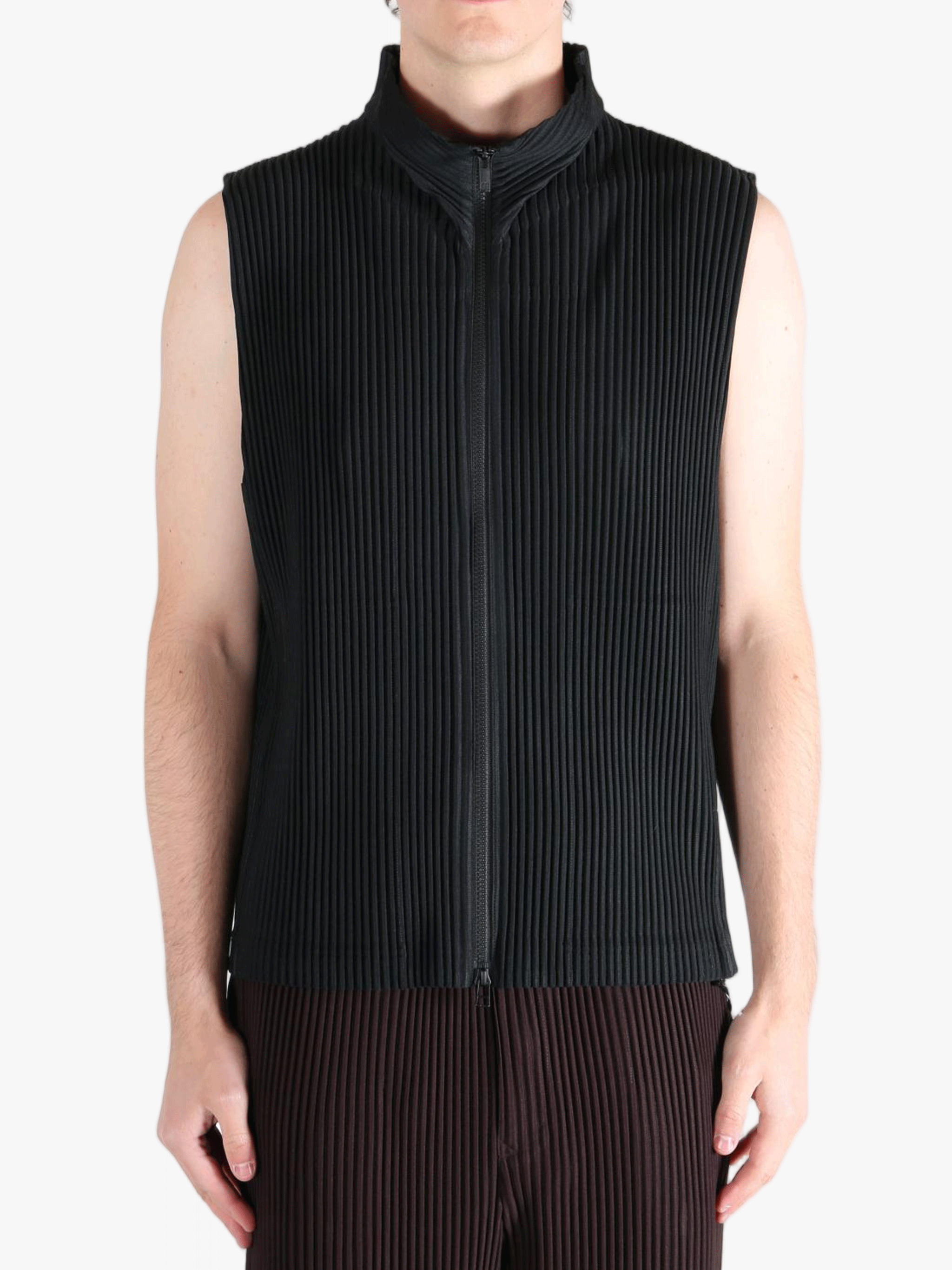 Black vest worn by a person, showing the vests fit