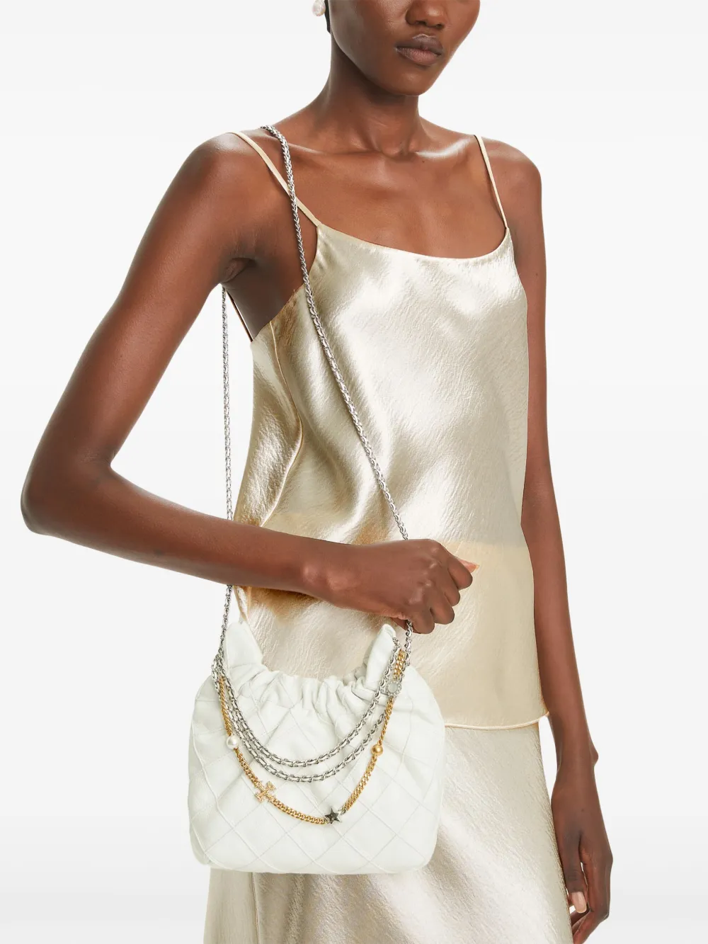 White bag on the back by a person, showing the bag fit