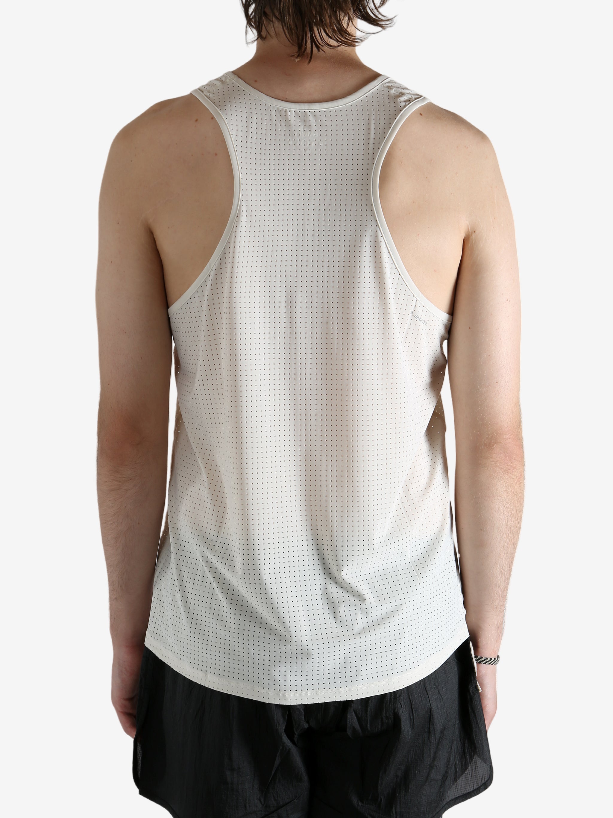 white shirt worn by a person, showing the shirt fit