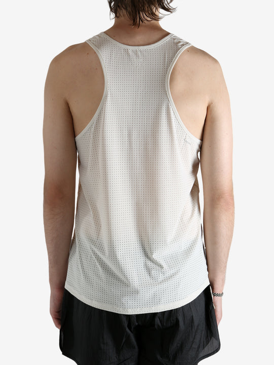 white shirt worn by a person, showing the shirt fit