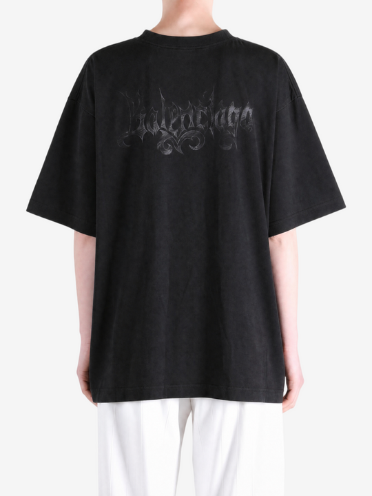 Black t-shirt worn by a person, showing the t-shirt fit