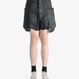 Black shorts worn by a person, showing the shorts fit