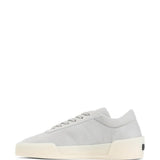 Grey sneakers, side view