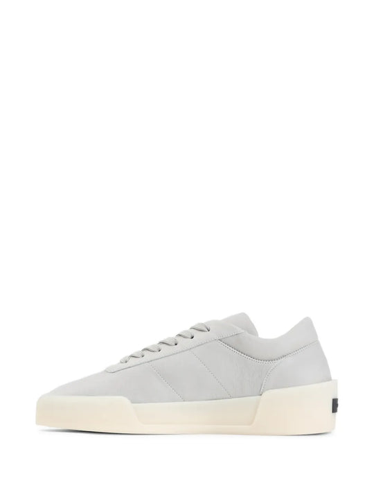 Grey sneakers, side view