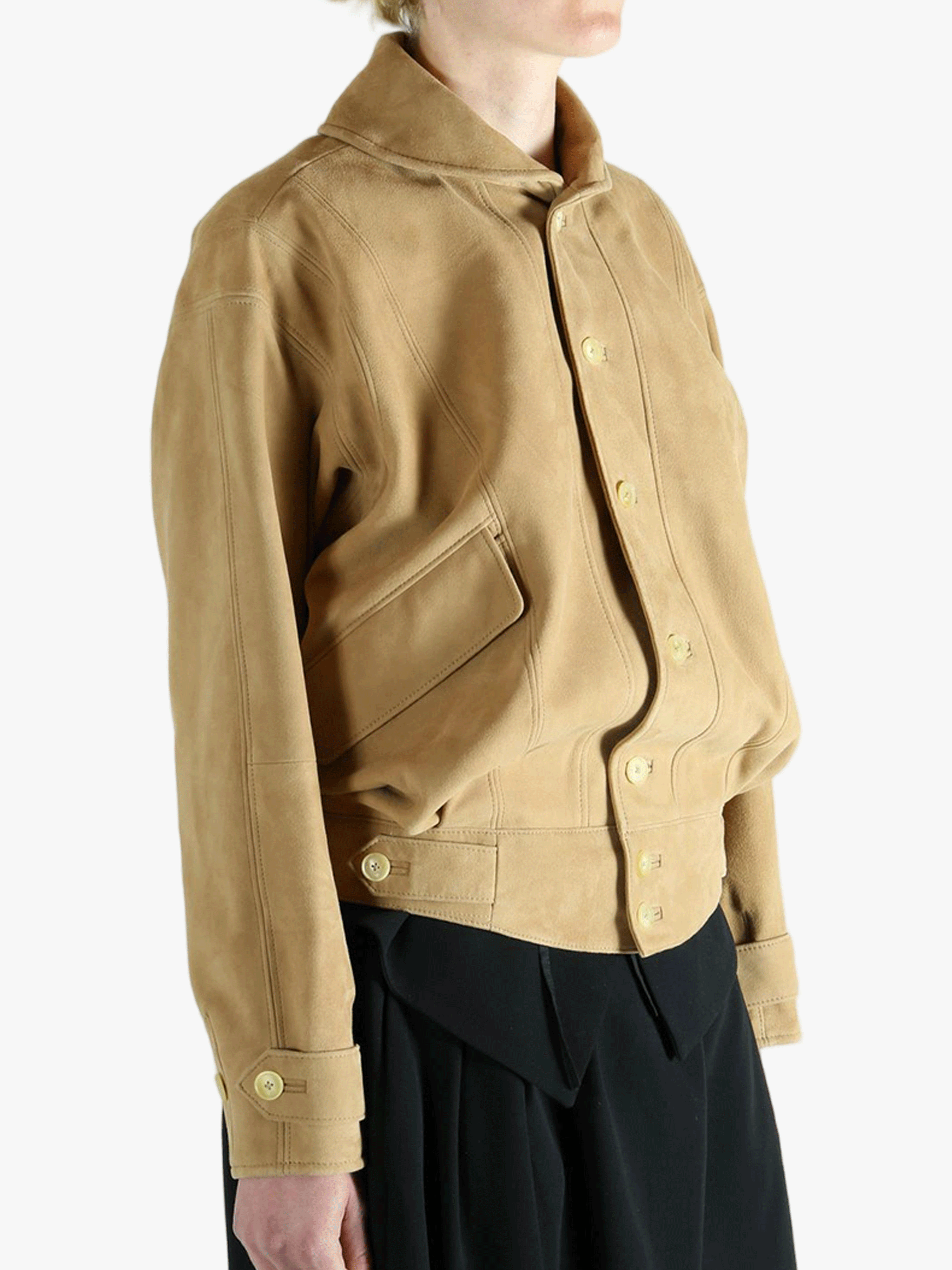 Yellow jacket worn by a person, showing the jacket's fit