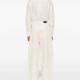 White pants, full body view