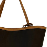 Close up of black bags, showing texture of the cotton and calfskin fabric