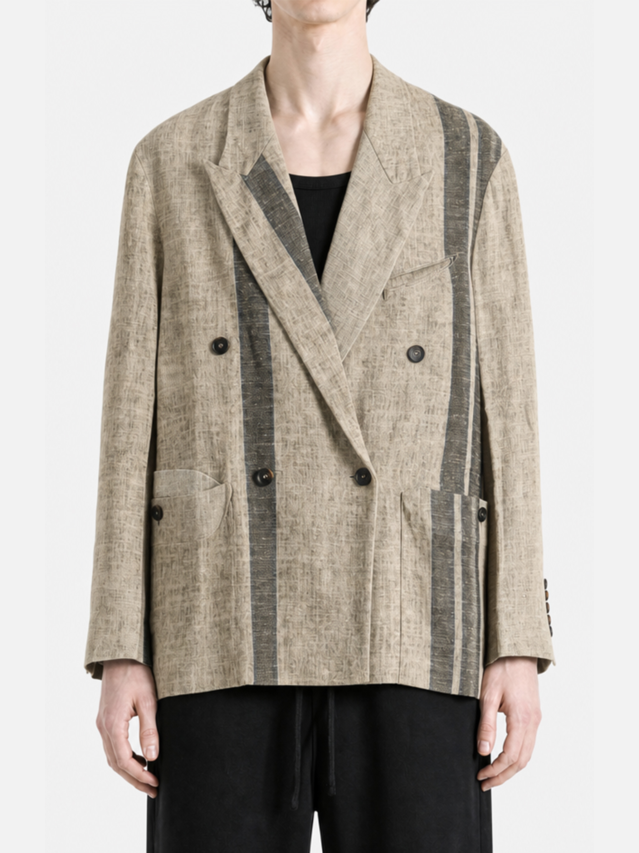 Grey jacket worn by a person, showing the jacket's fiit