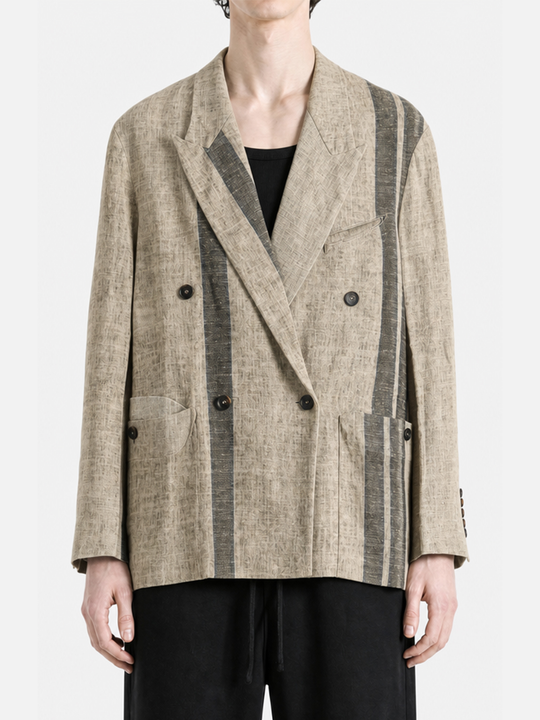 Grey jacket worn by a person, showing the jacket's fiit