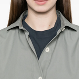 Close up of gray button-up shirt,showing texture of the cotton fabric