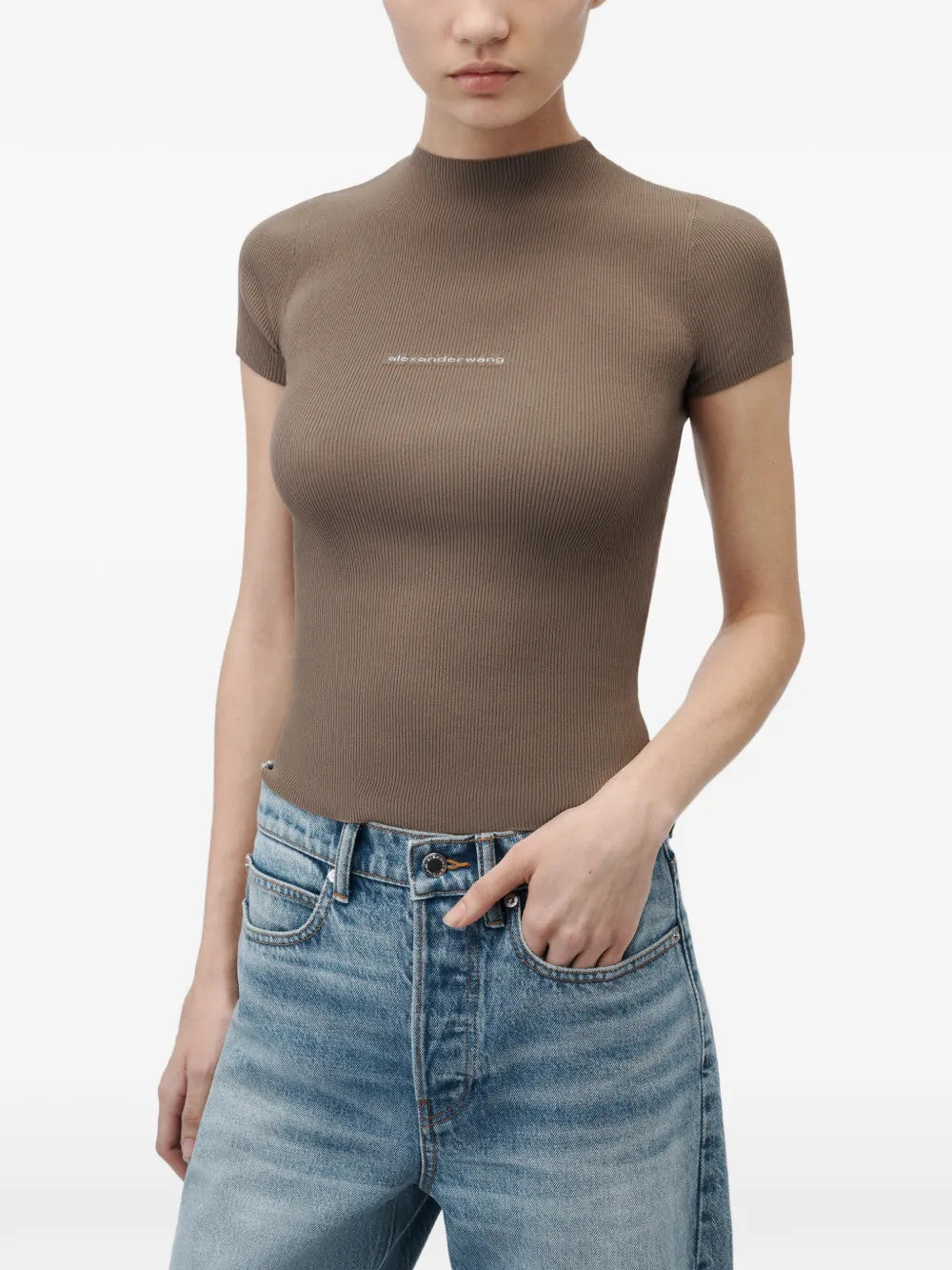 Brown t-shirt worn by a person, showing the t-shirt fit