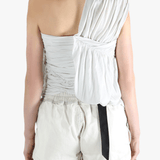 White tops worn by a person, showing the tops fit