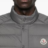 Close up of grey vest,showing texture of the polyamide fabric.