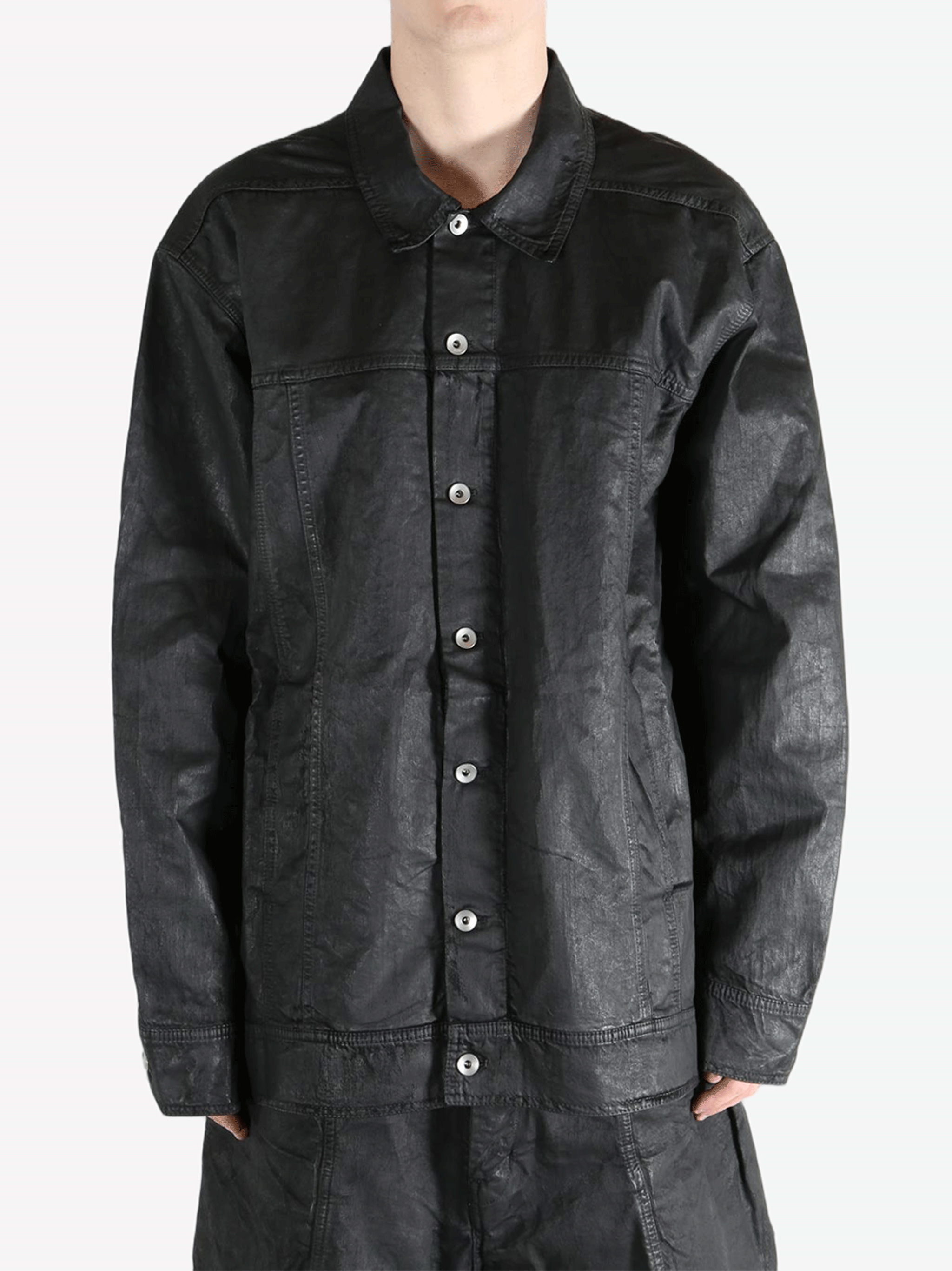 Balck jackets-coats worn by a person, showing the fit