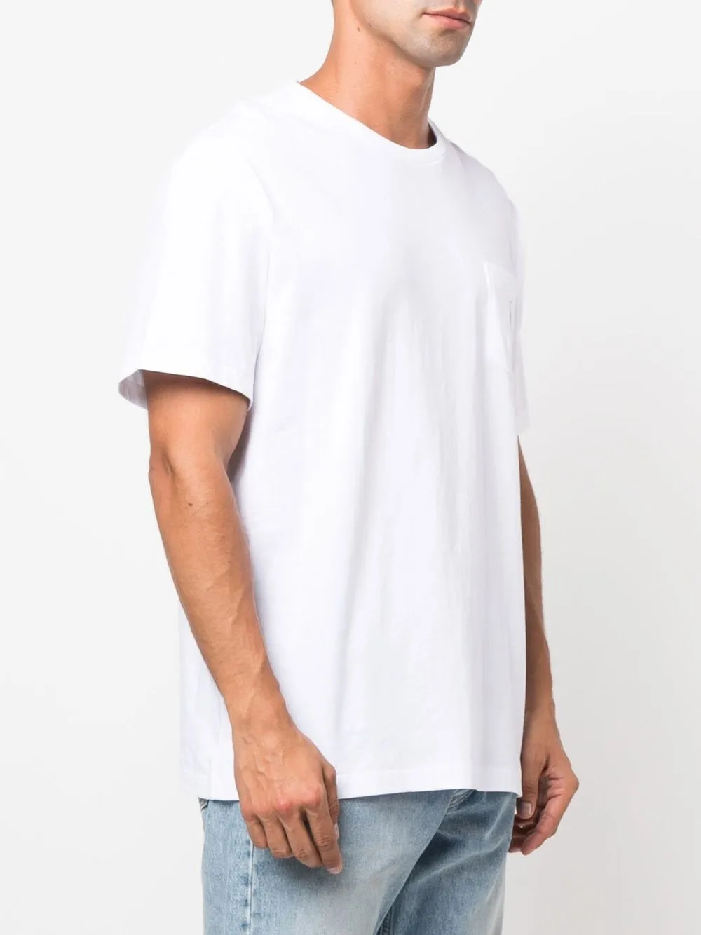 White T-shirt worn by a person, showing the T-shirt's fit