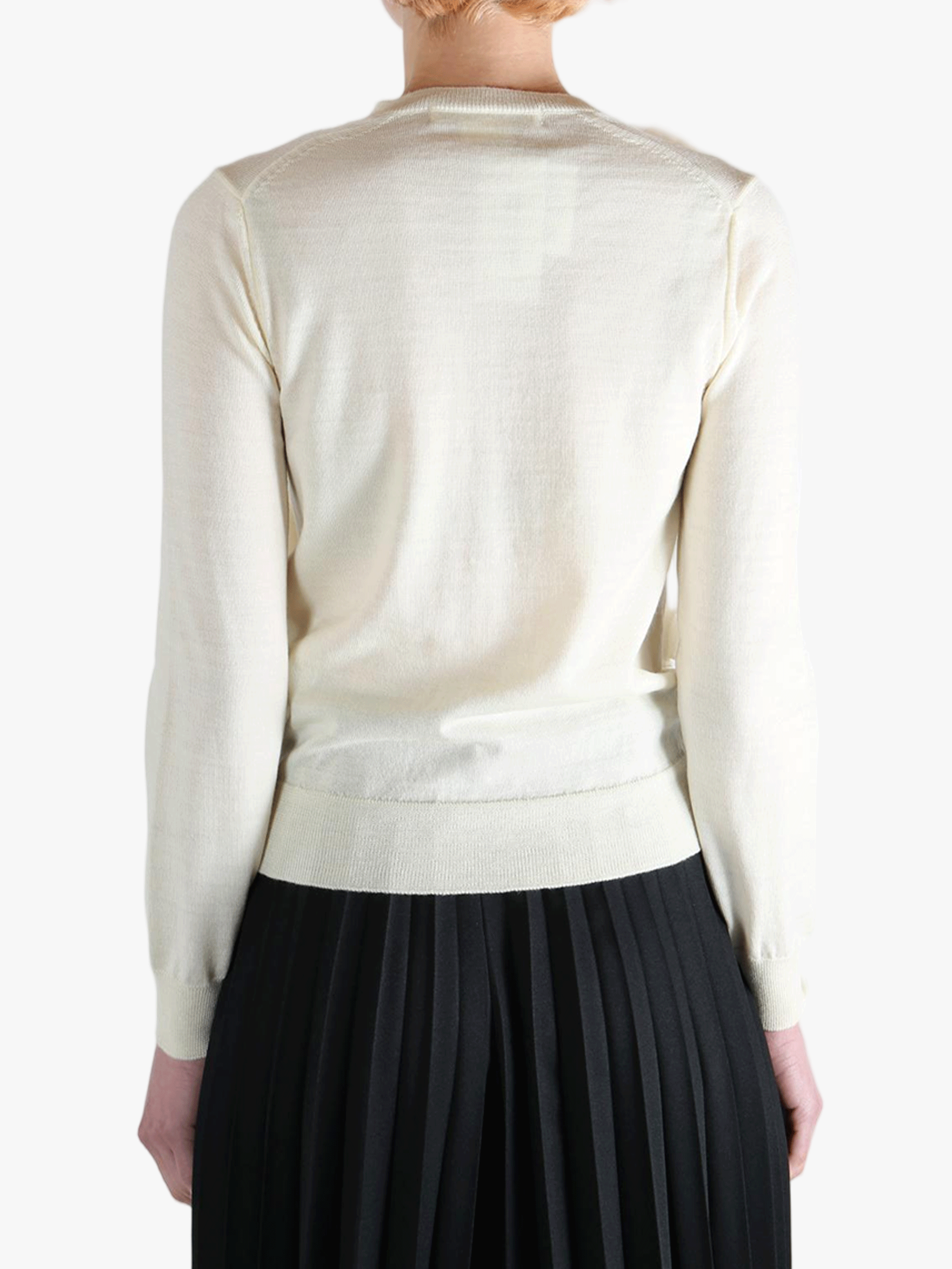 White jacket worn by a person, showing the jacket's fit