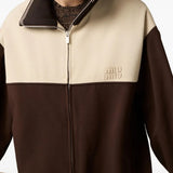 Brown sweatshirt worn by a person, showing the sweatshirt's fit