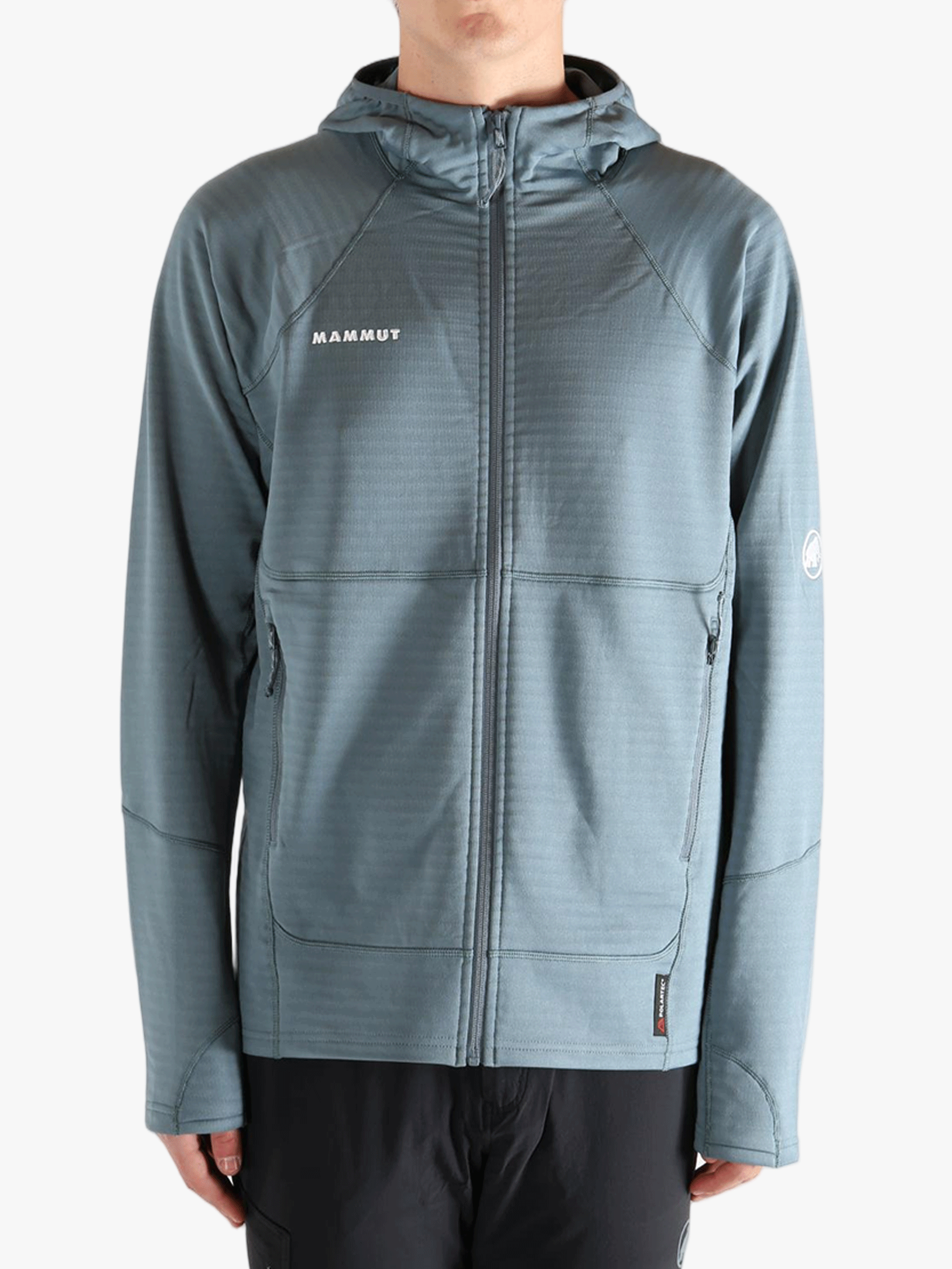 Blue jacket worn by a person, showing the jacket's fit