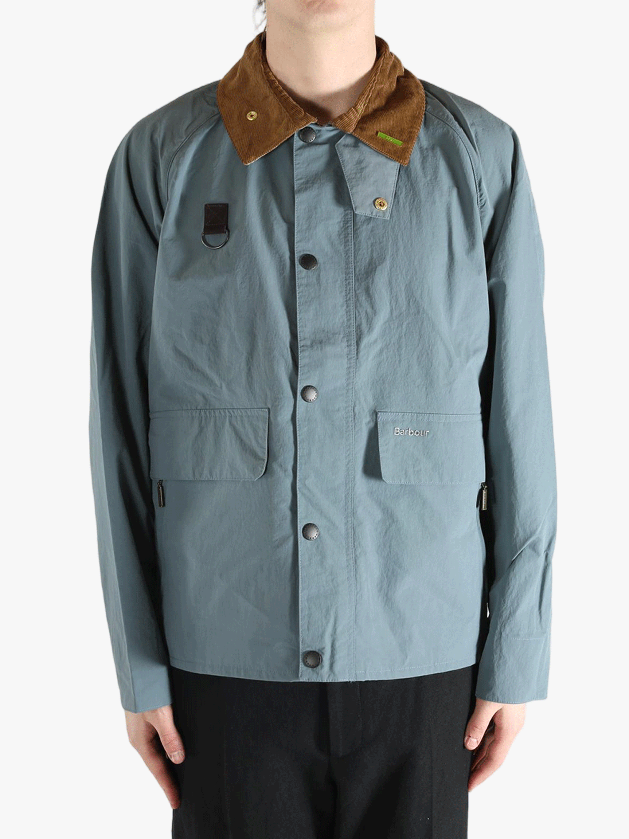 Blue jacket worn by a person, showing the jacket fit