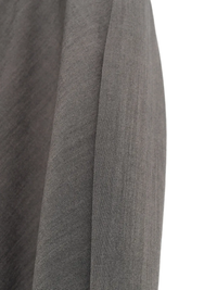 Close up of grey suit, showing texture of the wool fabric