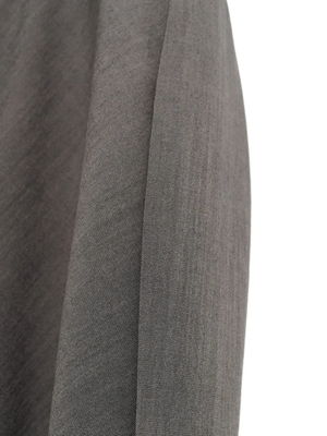 Close up of grey suit, showing texture of the wool fabric