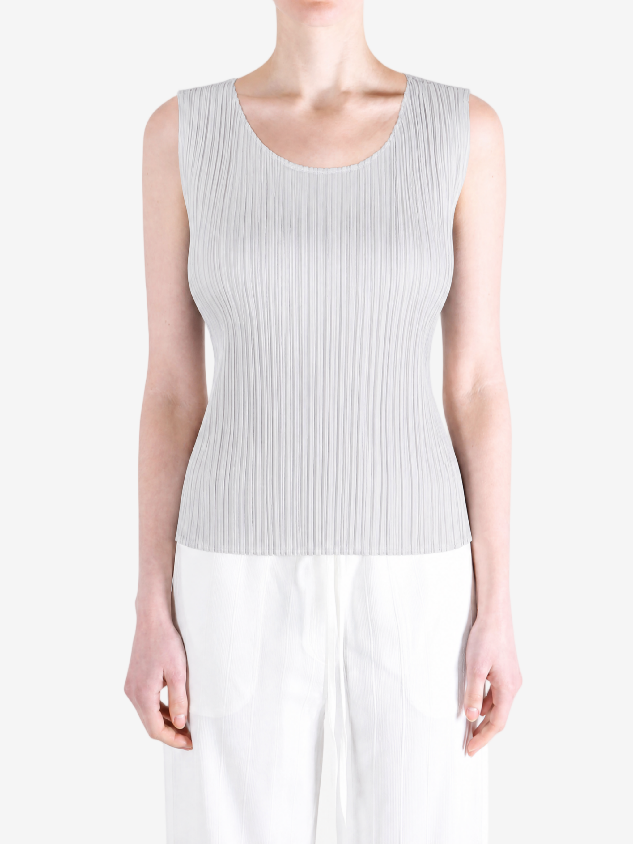 Grey shirt worn by a person, showing the shirt fit