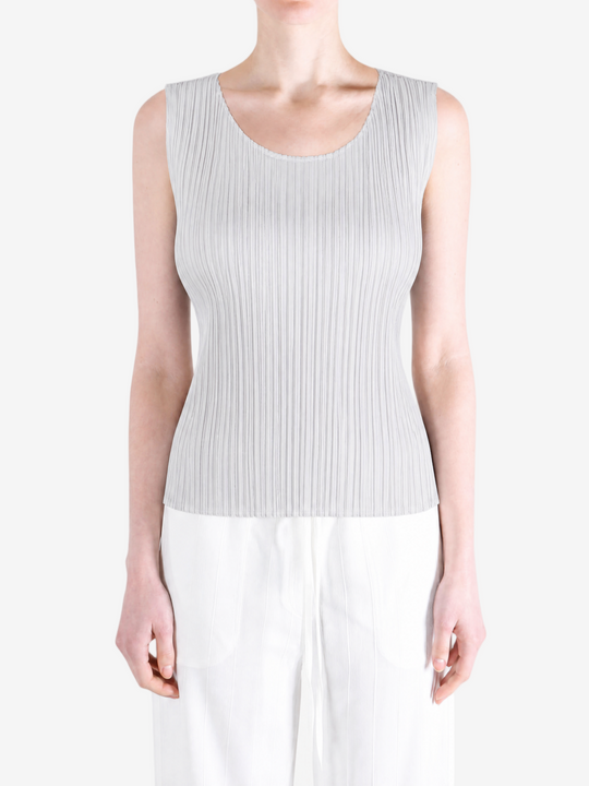 Grey shirt worn by a person, showing the shirt fit