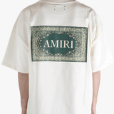 White t-shirt worn by a person, showing the t-shirt's fit