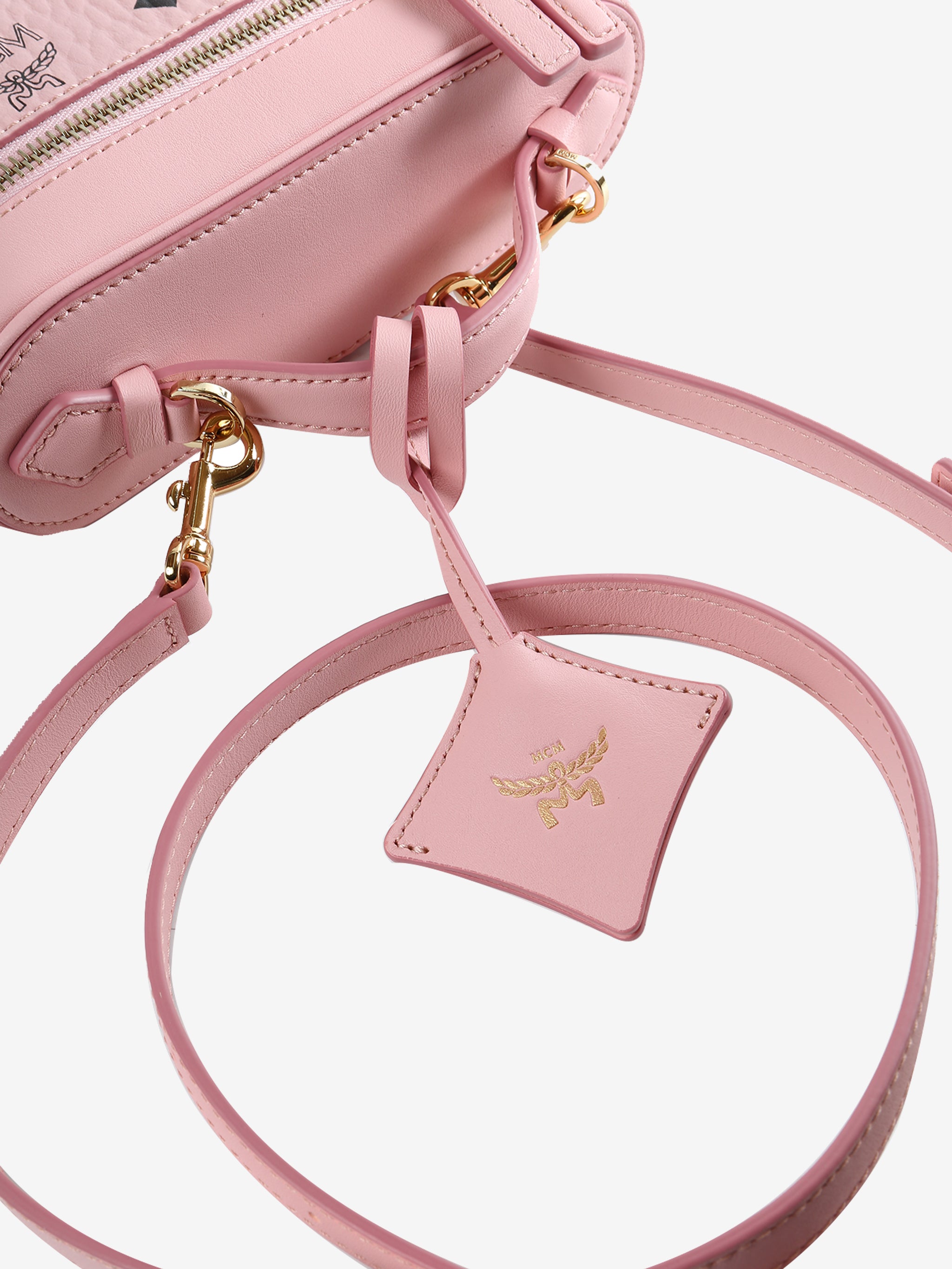 Close up of pink bag, showing texture of the Organic Leather fabric