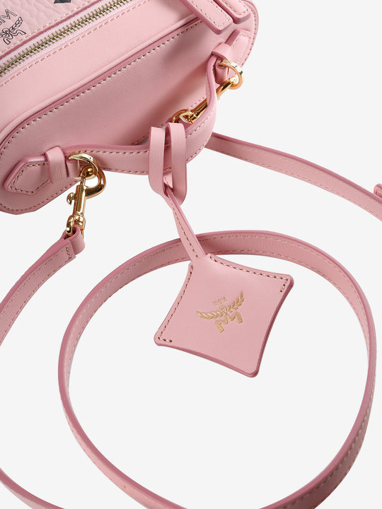 Close up of pink bag, showing texture of the Organic Leather fabric