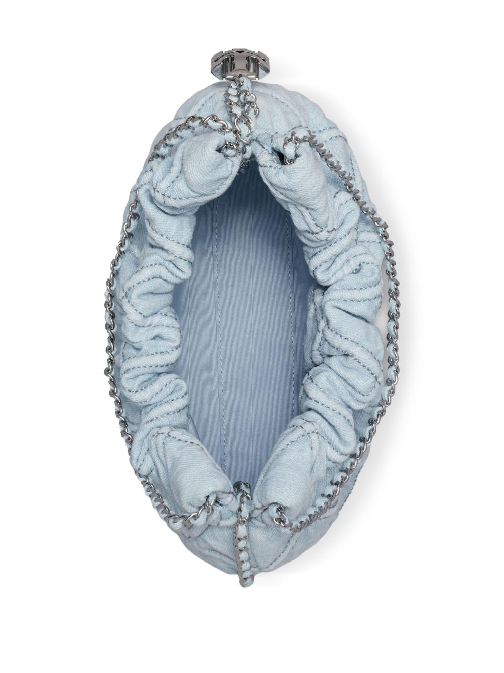 Close up of blue bag, showing texture of the napa leather and cotton fabric