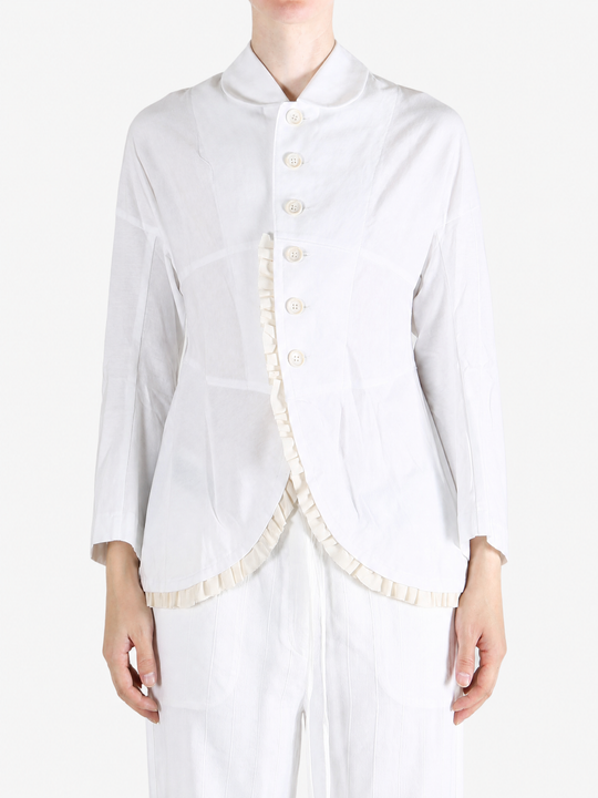 White jacket worn by a person, showing the jacket fit