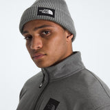 Grey hat worn by a person, showing the hat fit
