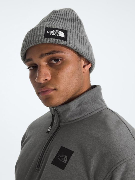 Grey hat worn by a person, showing the hat fit