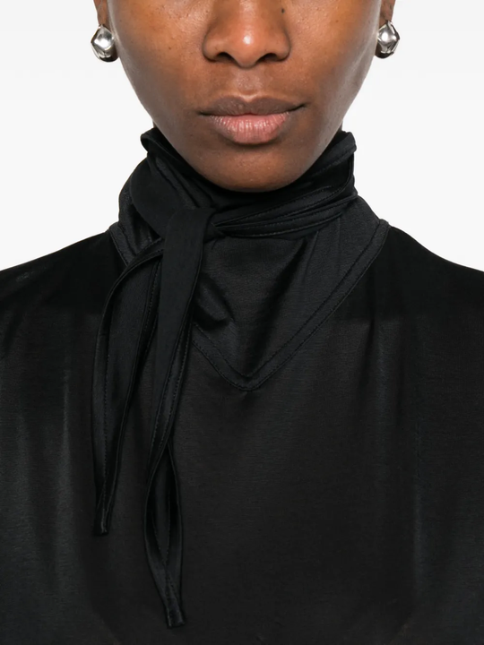 Close up of black top, showing texture of the viscose fabric