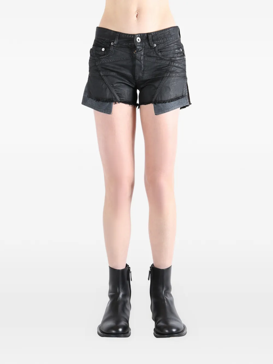 Black short worn by a person, showing the fit