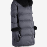 Black jacket worn by a person, showing the jacket fit