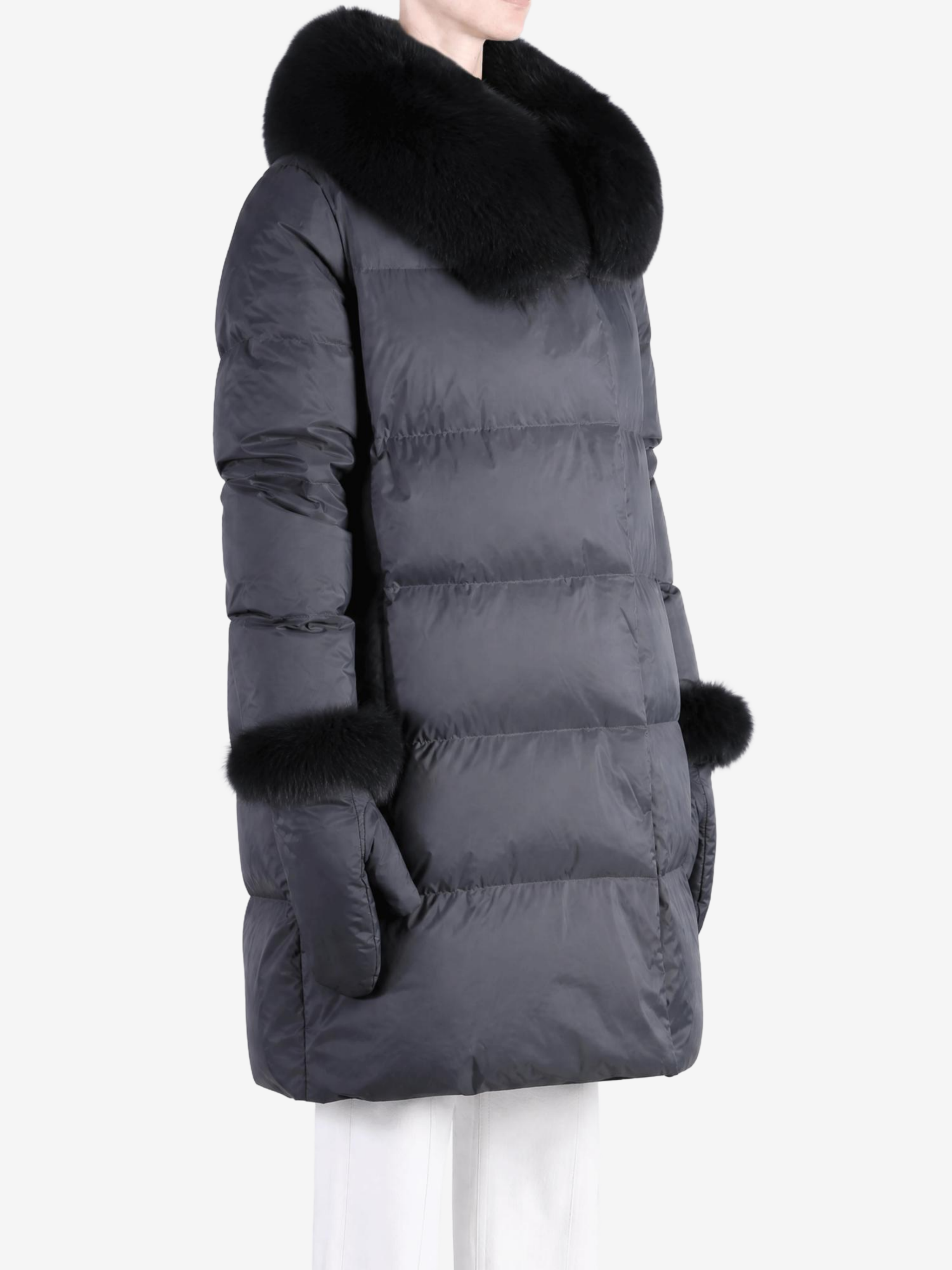 Black jacket worn by a person, showing the jacket fit