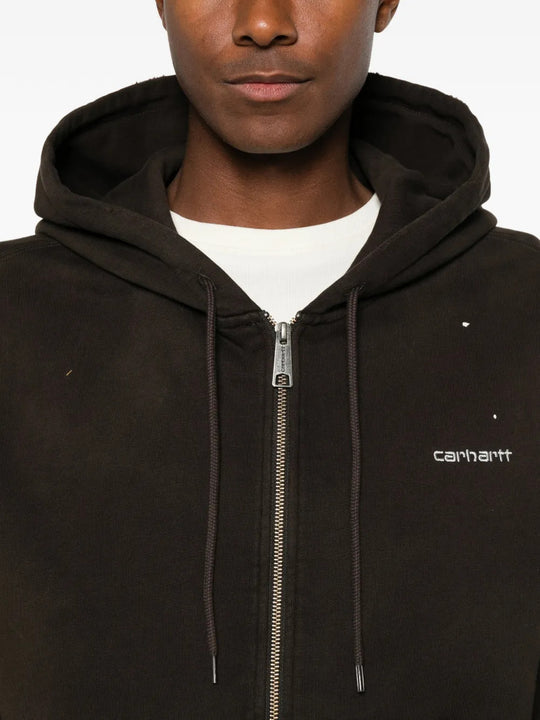 Black jacket worn by a person, showing the jacket fit