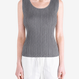 Grey shirt worn by a person, showing the shirt fit