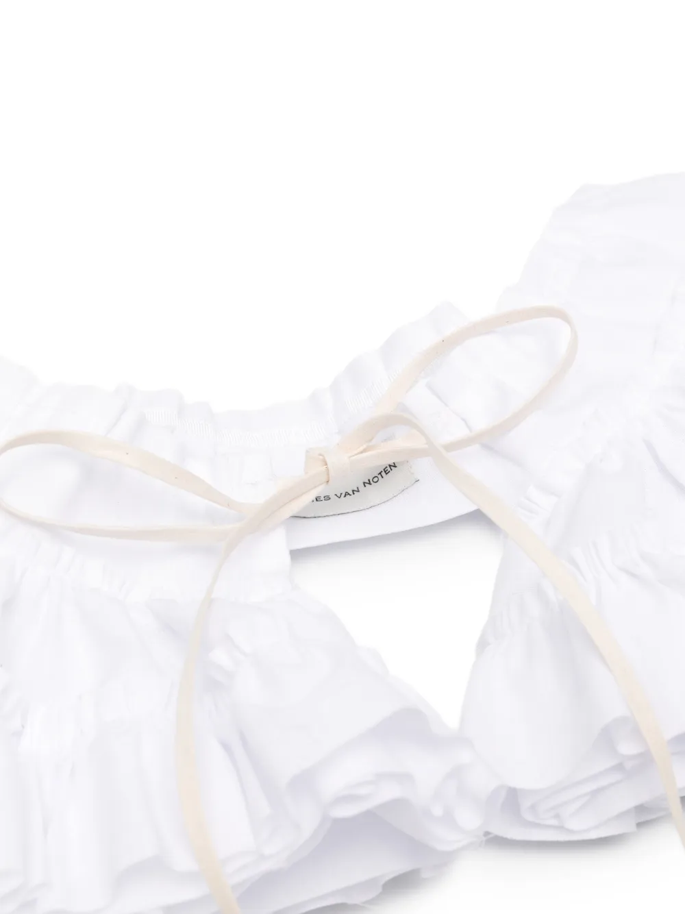 Close up of white belt,showing texture of the cotton fabric