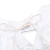 Close up of white belt,showing texture of the cotton fabric