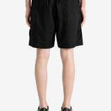 Black shorts, full body view