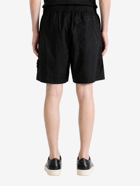 Black shorts, full body view